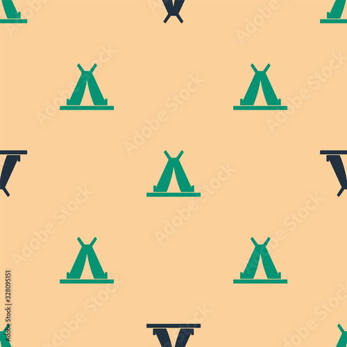 Green and black Traditional indian teepee or wigwam icon isolated seamless pattern on beige background. Indian tent. Vector Illustration