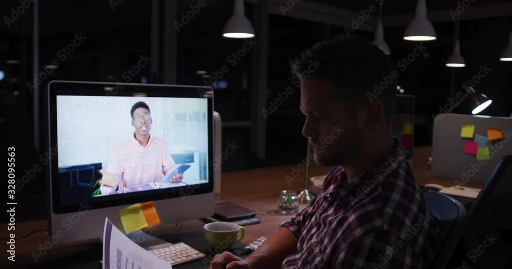 Businessman making video conferencing in a modern office Businessman making video conferencing in a modern office