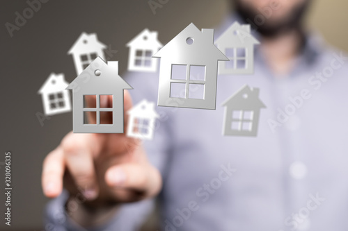 Real Estate Agent house han...