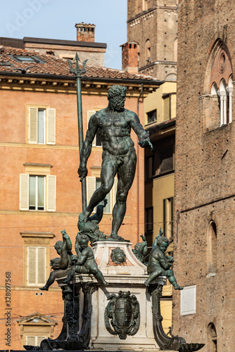 Bronze statue of Neptune (1566), Roman God, fountain in Piazza del Nettuno, Bologna downtown, Emilia-Romagna, Italy, Europe. Artist Giambologna (1529-1608)