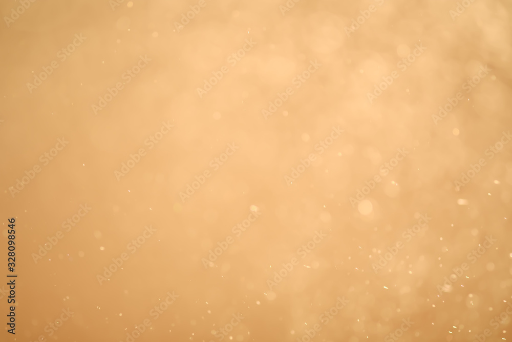 Golden glitter bokeh of light.Abstract blurred light Golden glitter bokeh of light.Abstract blurred light