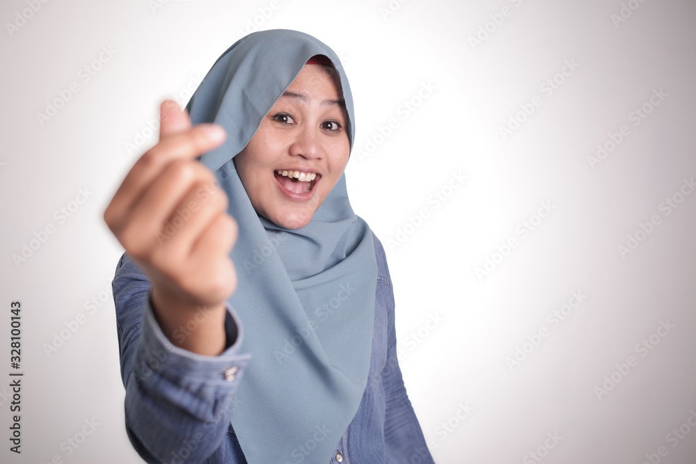 Muslim Woman Doing Money Gesture Muslim Woman Doing Money Gesture