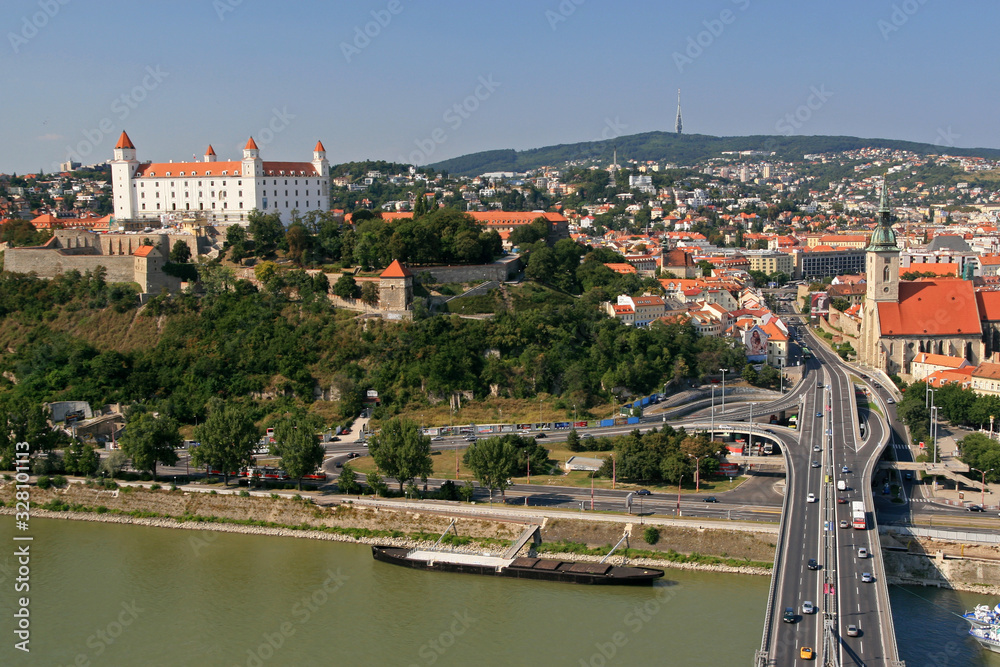 Obraz premium Landscape of Danube river and Bratislava castle - main castle of Bratislava, the capital of Slovakia
