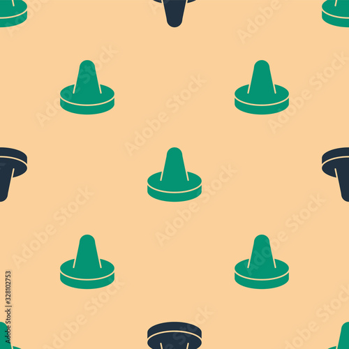 Green and black Mallet and puck for playing air hockey game icon isolated seamless pattern on beige background. Vector Illustration