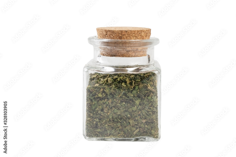 dried nettle herb or in latin Utricae folium in a glass jar isolated on white background. medicinal healing herbs. herbal medicine. alternative medicine dried nettle herb or in latin Utricae folium in a glass jar isolated on white background. medicinal healing herbs. herbal medicine. alternative medicine