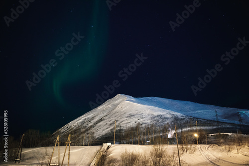 Polar arctic Northern lights Aurora Borealis activity in winter Finland, Lapland photo