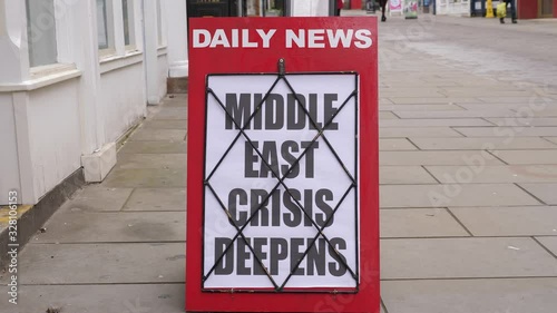 4K: Newspaper Headline Board about the Middle East Crisis conflict - News stand. Stock Video Clip Footage photo