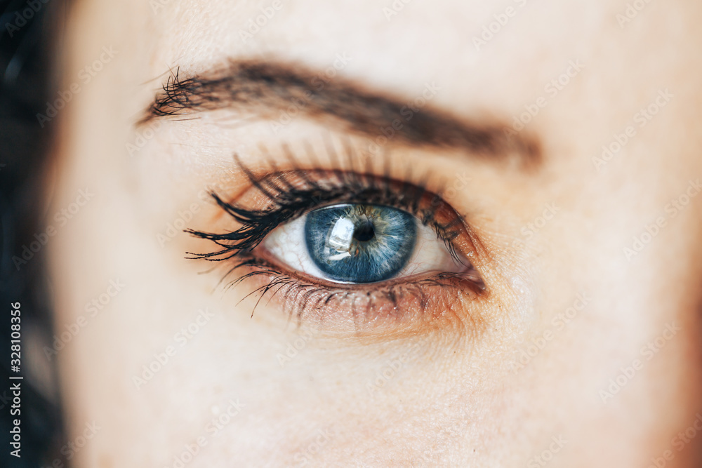 Fototapeta premium beautiful blue eyes with long eyelashes lenses vision