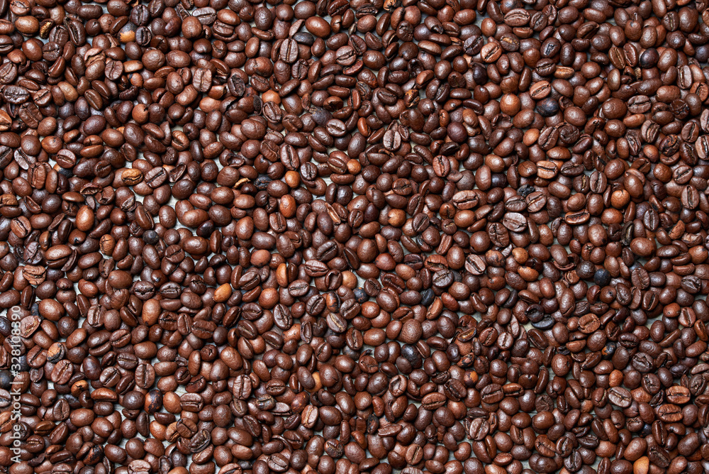 Roasted coffee beans with background Roasted coffee beans with background