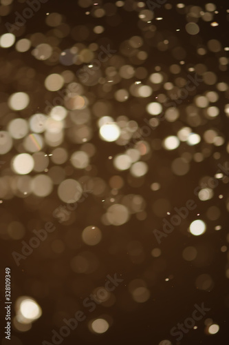 Golden glitter bokeh of light.Abstract blurred light