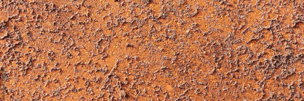 Wet sand on red paving stone after the rain. Panoramic background Wet sand on red paving stone after the rain. Panoramic background
