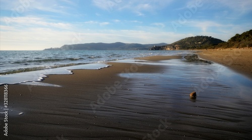 sunset on Mediterranean beach in Grosseto province, Tuscany, Italy