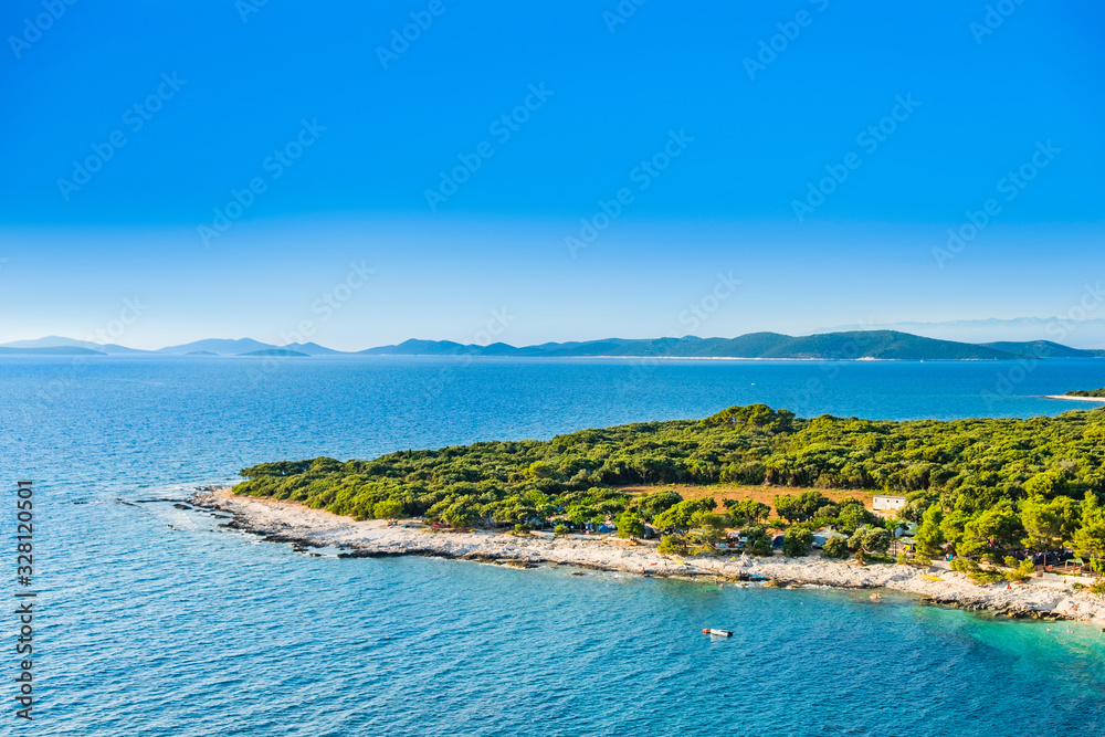 Beautiful sea cape on Adriatic sea in Croatia, Dugi Otok island, camping  resort in pine forest Stock Photo | Adobe Stock