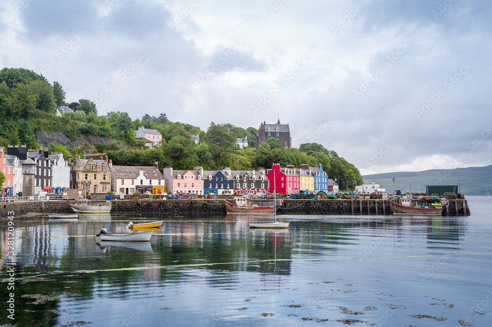 Tobermory embankment with traditional colorful houses. Popular touristic town with famous distillery. Hebrides, Scotland.