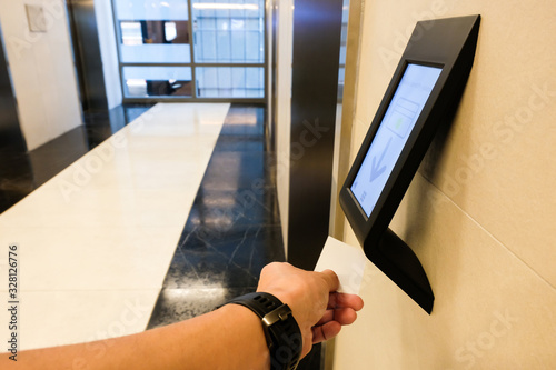 RFID reader in front of the elevator which only allow authorized person in the building to use. One of security feature in modern condominium, apartment or office building