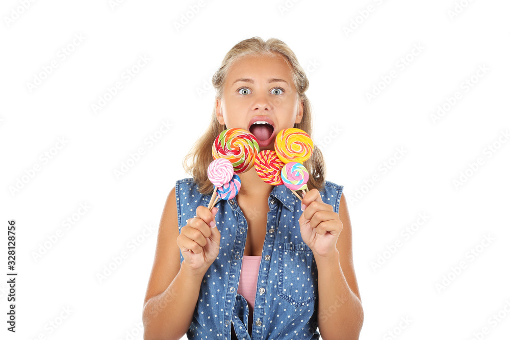 Portrait of young girl holding lollipops on white background Portrait of young girl holding lollipops on white background