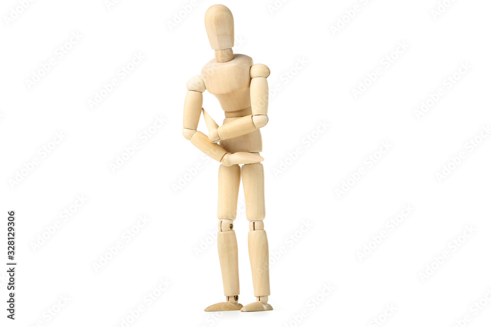 Wooden figure having a stomach ache on white background Wooden figure having a stomach ache on white background