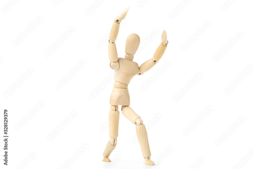 Wooden figure dancing on white background Wooden figure dancing on white background