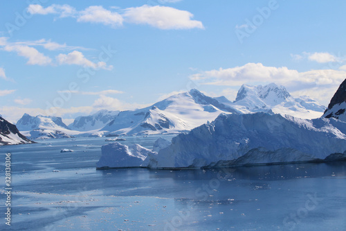 Mountains of the Antarctic Peninsula. Icebergs and mountains in the Gerlache Strait in the Danco Coast  Antarctica