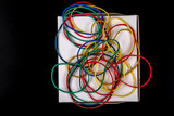 Close-up colorful rubber band on white background..
