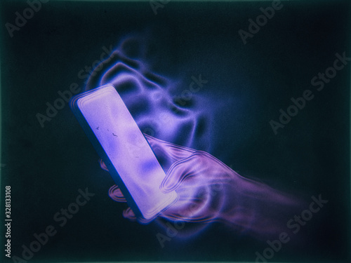 Hand and smart phone retro futuristic illustration photo