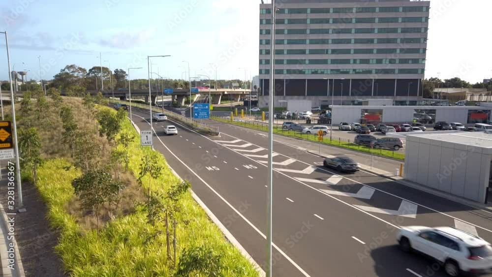 High angle shot of busy Sydney Kingsford Smith Airport Drive highway and express pickup car park. Australia. High angle shot of busy Sydney Kingsford Smith Airport Drive highway and express pickup car park. Australia.
