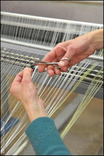 Textile industry with knitting machines in factory - italian - made in Italy  © andrea