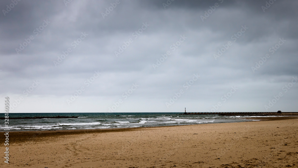 Cloudy day in the Mediterranean Sea in Cubelles beach, Barcelona, Catalonia, Spain