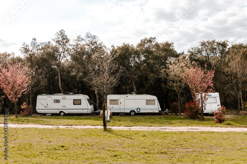 Caravans parked in a campsite photo