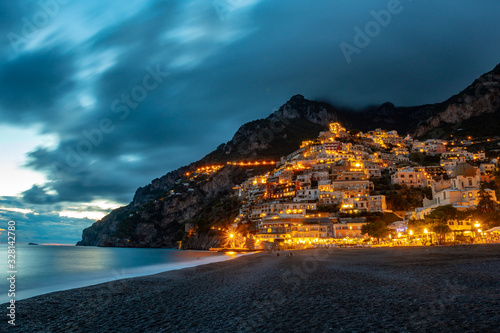 Landscape with Positano town at famous amalfi coast at night, Italy