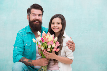 tulip bouquet. portrait of family, daughter and father. Father and little girl enjoy spring. happy womens day on 8 march. birthday surprise for her. fathers day concept. family bonding time