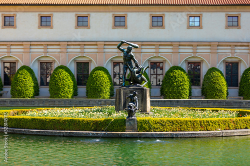 Photography Hercules statue in the middle of a pond in the Waldstein garden in Prague, Czech