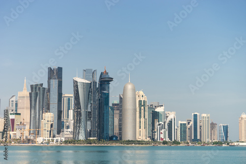 View of city center with skyscrapers from the other side of sea in Doha, Qatar