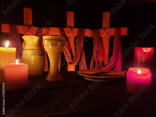 Holy Week With Communion Set and Candles on Black table