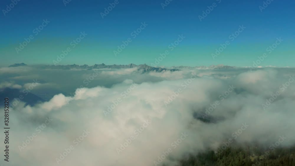 Above the clouds in the mountains with trees with drone 4k Above the clouds in the mountains with trees with drone 4k