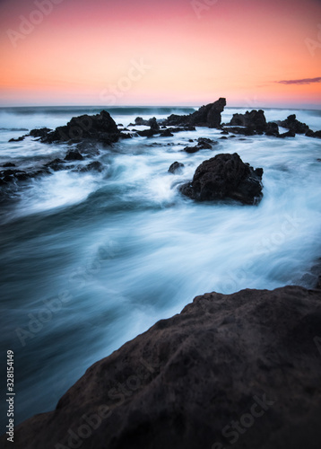 Long Exposure of Clear Blue Water at Sunset in Maui Hawaii © Lucas