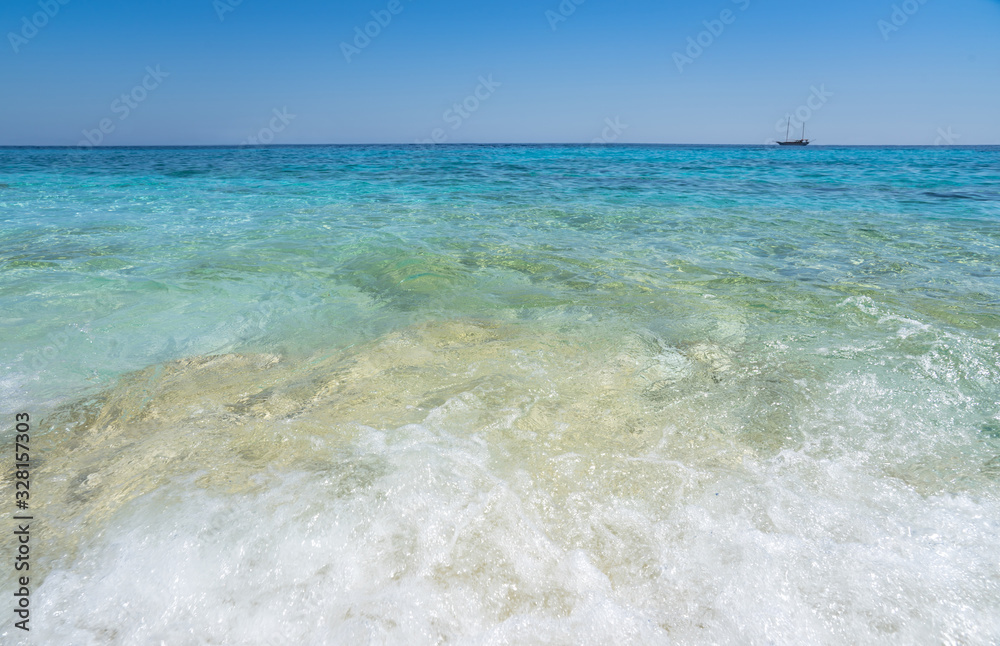 Obraz premium Clear azure coloured sea water, Sardinia, Italy