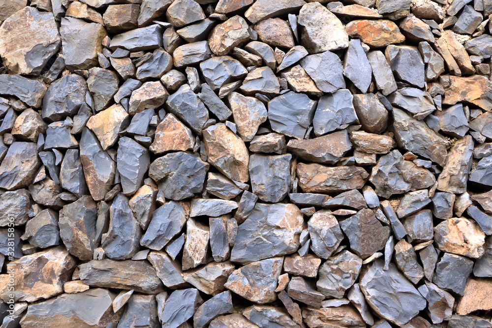 Texture of a grey granite stone wall for background Texture of a grey granite stone wall for background