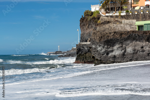 Black lava sand beach in Puerto Naos, La Palma, Canarian islands, Spain photo