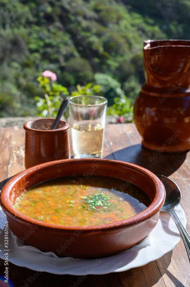 Homemade vegetables soup served with Canarian gofio flour based on local recipe of Masca village, Tenerife, Spain Homemade vegetables soup served with Canarian gofio flour based on local recipe of Masca village, Tenerife, Spain