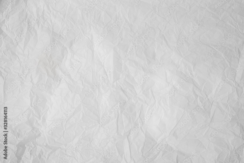 Fototapeta premium Old crumpled grey paper background texture