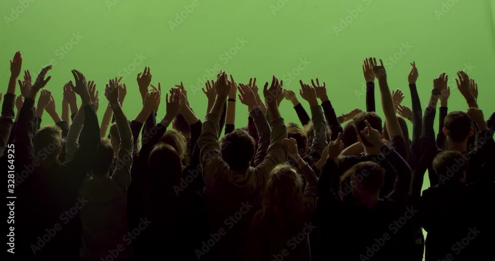 GREEN SCREEN CHROMA KEY Model released, back view of huge crowd dancing and cheering at a concert or a show. Shot on RED Helium 8K in RAW