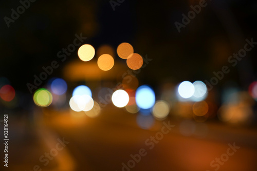 Night city street lights background and street lights blur bokeh © FATIR29