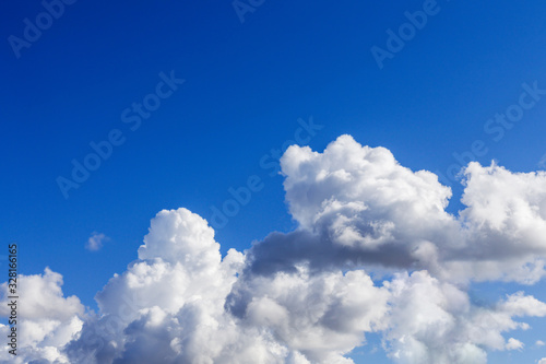 Blue sky background with white clouds Abstract background © Anna