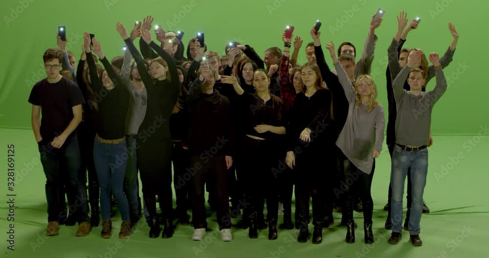 GREEN SCREEN Front view huge crowd of people with phones in hands at live concert or show. Shot on RED Helium 8K, Prores 4444
