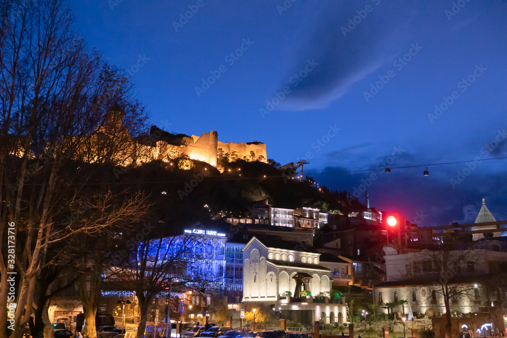 Fototapeta premium Night Tbilisi. The fortress of Narikala. Cable car. Georgia. Tbilisi.