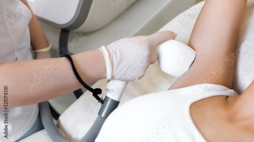 Laser hair removal under the armpits.