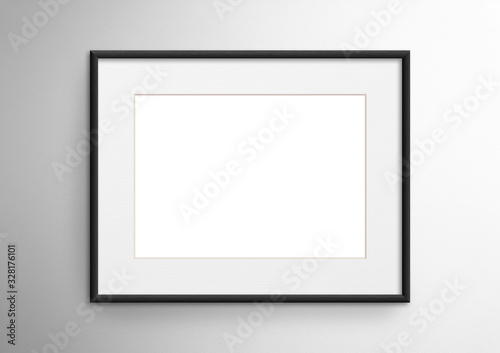 Empty frame. Blank black mounted landscape frame on white wall