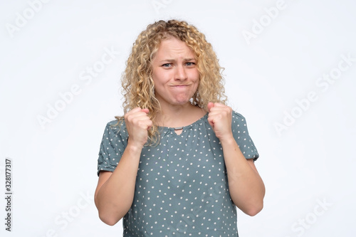 Canvas Print Woman showing childish anger and tantrum for teen rebellion being offended