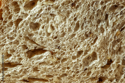 freshly baked rye bread with bran and cereal seeds: texture close-up. Healthy food.